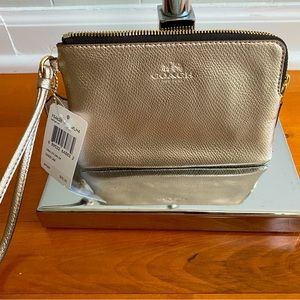 NWT light gold Corner Zip Wristlet COACH